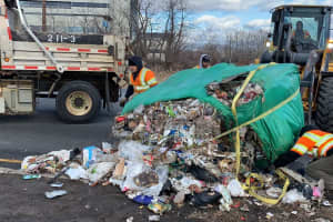Truck Keeps Going After Dropping Ton And Half Of Garbage On Route 46 Ramp