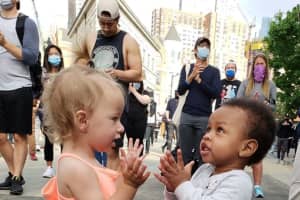 Photographer Captures Precious Moment During Jersey City Rally