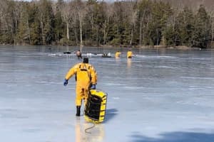 Firefighters Rescue Six From Pond After Falling Through Ice
