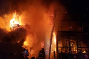 Four Buildings Destroyed In Three-Alarm Overnight Fire