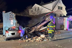 Of All Places: SUV Crash Destroys Auto Repair Shop In Bergenfield