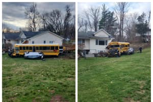 School Bus With Children On Board Crashes Into House In Area