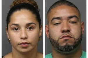 $57G Seized From Couple Driving Through Fort Lee; Charged With Money Laundering