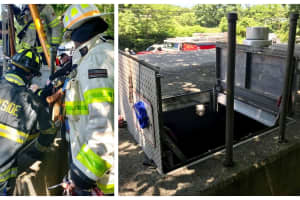 PHOTOS: Responders Rescue Utility Worker Who Fell 10 Feet Into Tinton Falls Work Space