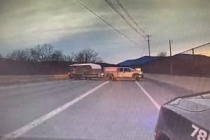 Accord Man Blocks Roadway With Truck, Camper, Refuses To Move Police Say