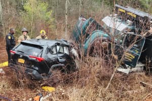Area Woman Killed In Head-On Crash Between Compact SUV, Dump Truck