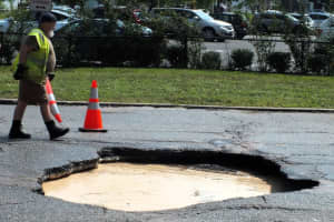 Water Main Break Opens Gaping Hole Off Route 208