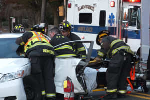 Ridgewood Firefighters Free Driver In Crash