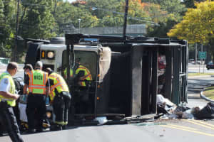 Packed Garbage Truck Tips On Route 17 Ramp