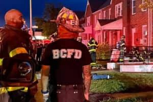 Elderly Woman Dies, Firefighter Injured In Baltimore House Fire