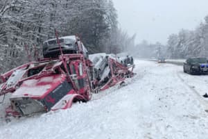 Dislodged Car Falls Onto Carrier Driven By CT Man On Slippery NH Highway