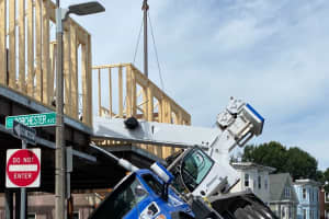 Crane Crashes Into Building At Boston Construction Site