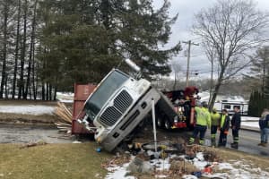 Auburn Road 'Impassable' Following Dump Truck Rollover Crash: Police