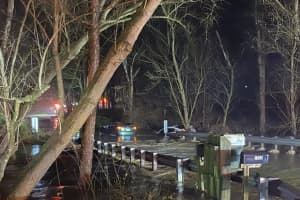 Driver Rescued By Boat After Being Swept Away By Montgomery County Flood Waters