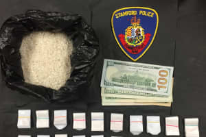 Stop Of BMW At Stamford Hotel Nets Suspects With 300 Bags Of Heroin
