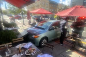 Lunching Couple Escape Injury When Unoccupied Car Rolls Into Raymond's In Ridgewood