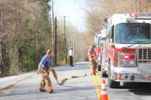 Mahopac Brush Fire Sandwiched On Tree Line Threatens Home