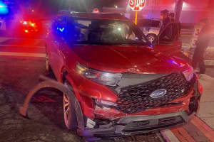 Driver Hospitalized After SUVs Collide In Ridgewood