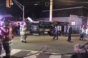Hawthorne Ambulance Knocked On Its Side, Three Removed