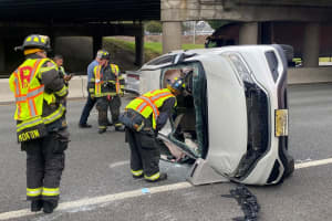 Trapped Driver Freed By Firefighters After SUV Rolls Onto Route 17