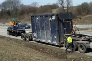 Garage Haulers Charged With Littering Area Highway, Police Say