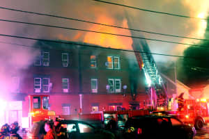 PHOTOS: Gas-Fed Fire Destroys Multi-Family, Mixed-Use Building In Passaic, Dozens Displaced