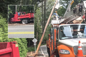 Contractor's Truck Splits Utility Pole On Busy Northwest Bergen Road
