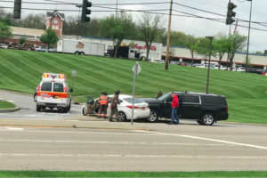 SUV, Car Crash At Entrance To Shoppes At South Hills