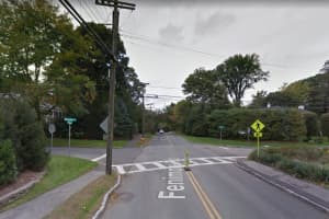 Driver With 10 License Suspensions Cited After Crashing Onto Scarsdale Lawn