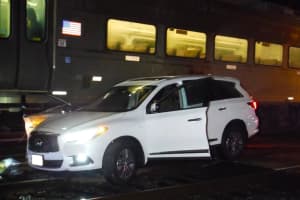 Woman Charged With Careless Driving After SUV Collides With Train In Bergen