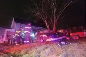 Jaws Of Life Used To Extricate Person After Car Crashes Near House In Danbury