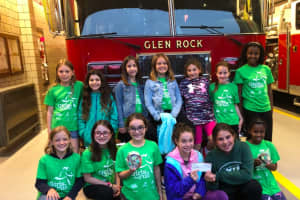 Glen Rock Girls Donate $500, 2 Pet Oxygen Masks To Volunteer Firefighters