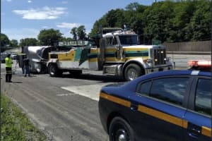 Dump Truck Strikes Overpass On I-684