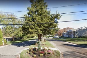 Suspect At Large After Teen Shot Outside Long Island Condominium Complex