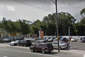 Man, Juvenile Nabbed Stealing Items From Long Island Auto Sales Trailer, Police Say