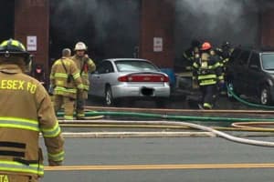 PHOTOS: Middlesex Volunteer Firefighter Hurt Battling Auto Shop Blaze