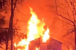 PHOTOS: Fire Crews Douse Late-Night Sussex County Camp Building Blaze With 62K Gallons Of Water