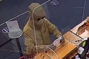 Police Ask Public's Help In Search For Bank Robbery Suspect