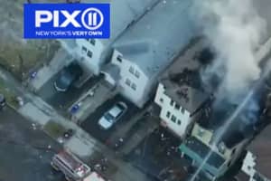 Blaze Rips Through Newark Home Displacing 25, Injuring Fire Chief