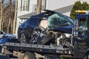 Unbuckled Woman Critical After Running Stop Sign, Striking Garbage Truck In Toms River: PD