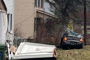 Car Rips Off Home's Front Porch In Warren County Crash