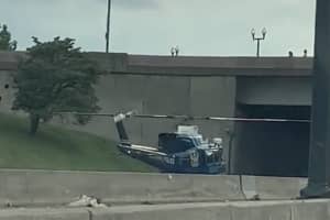 Helicopter Lands On I-395 To Assist Officer, Driver Captures It All