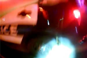 Sparta Cop Nearly Struck By Speeding Driver Injecting Drugs (VIDEO)