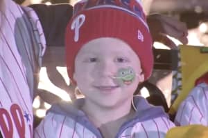 Neighbors, Phillies Join Surprise Holiday Parade For South Jersey Brain Cancer Patient: Reports
