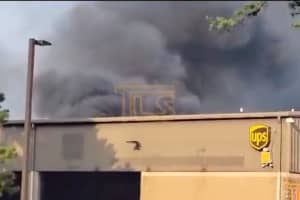 Fire Erupts At UPS Facility At Jersey Shore