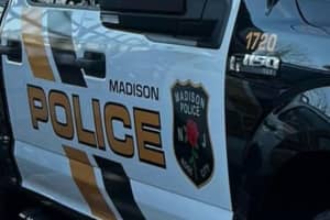 Madison PD Corporal Hurt Trying To Detain Bank Fraud Suspect Who Clung To Side Of Getaway Car