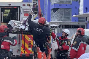 First Responders Rescue Worker Injured On Roof Of Northwest DC Building (VIDEO)