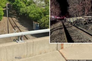 Freight Train Derailment Shuts Down Valley Falls Highway; 2 Cars Plunge Into River