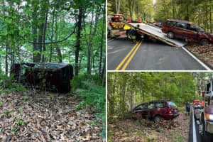 Vehicle Crashes Into Woods, Flips On Its Side In Westchester
