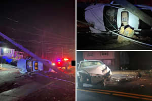 Pole Comes Crashing Down On Rolled-Over Car In Vernon